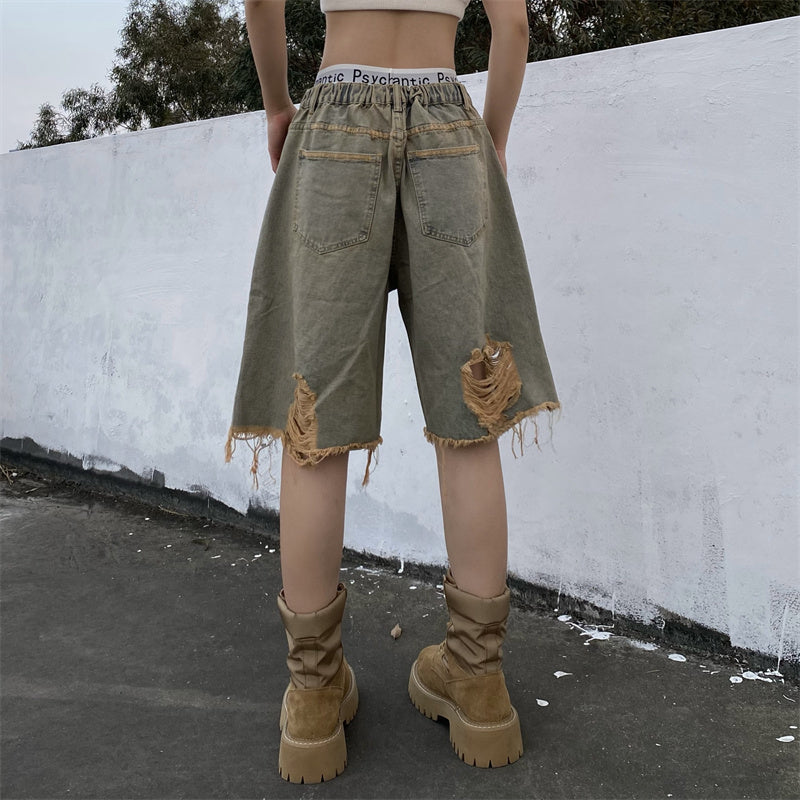 Loose Retro Distressed Ripped Jeans for a Timeless Look