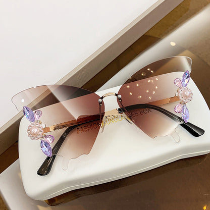 Butterfly-Shaped Diamond-Encrusted Sunglasses for a Glamorous Look